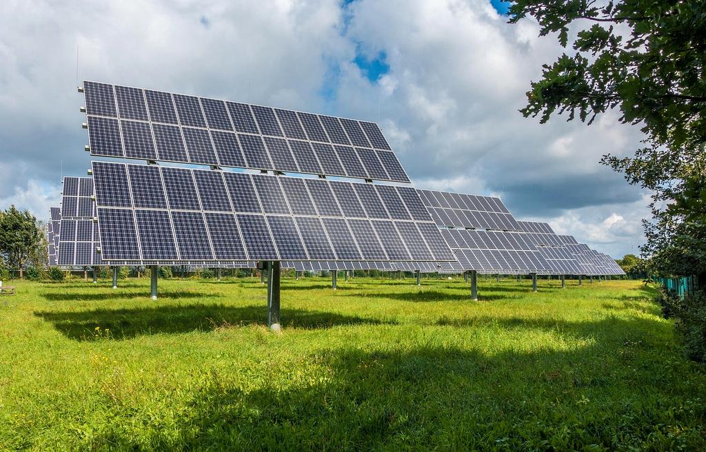 Wind turbines and solar panels in nature